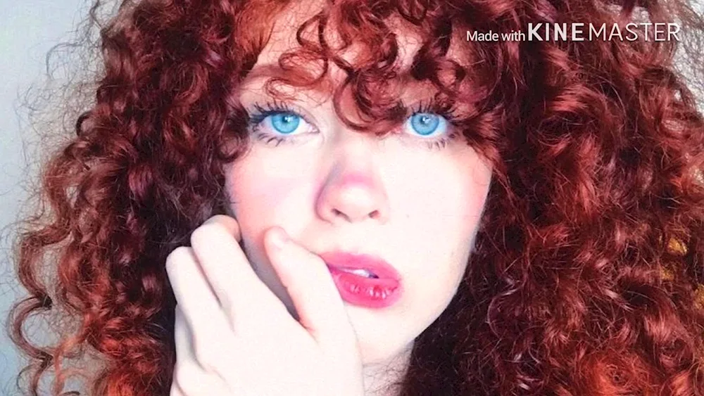 Afro curls redhead
