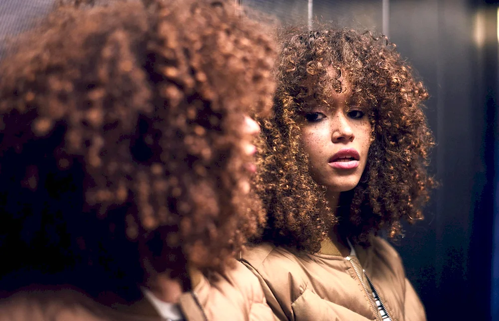 Afro curls with bangs