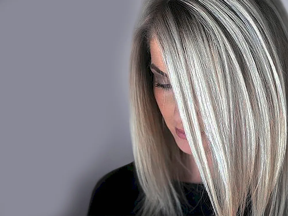 Air- touch colouring on blonde hair