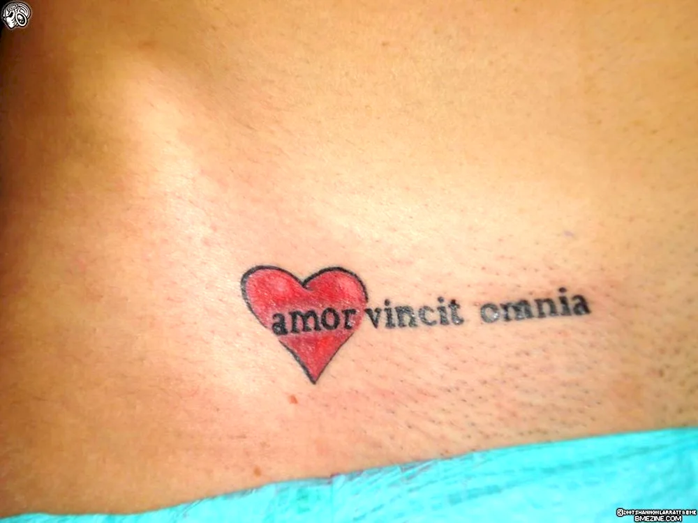 Live laugh love tattoo in Latin