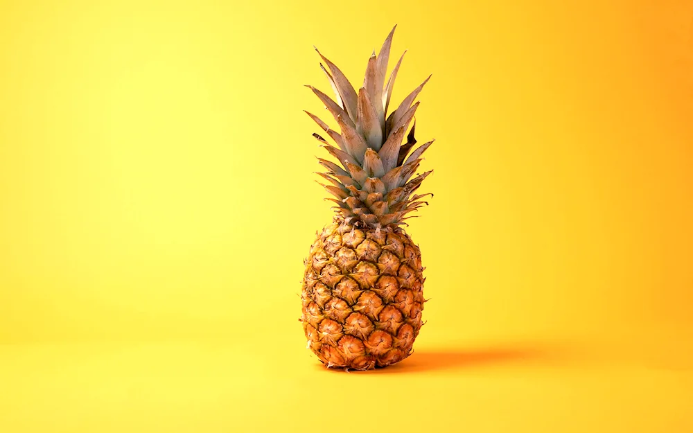 Ananas wallpaper. on a yellow background