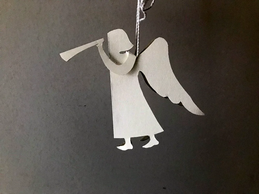 Paper angels with their own hands