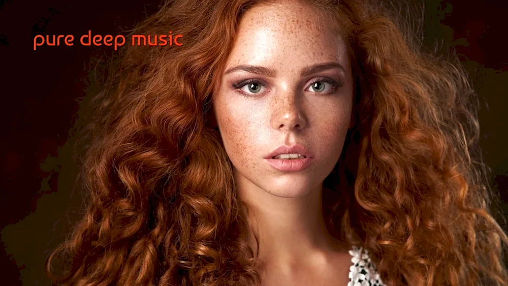 Artist with red curly hair