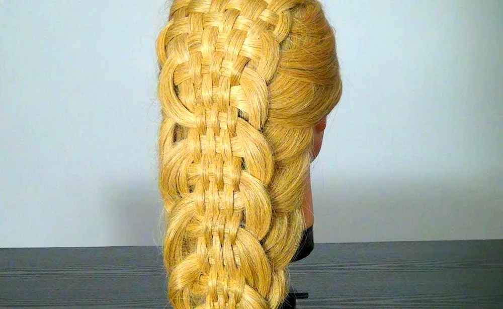 An openwork braid for long hair