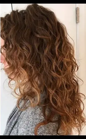Balayage on dark curly hair