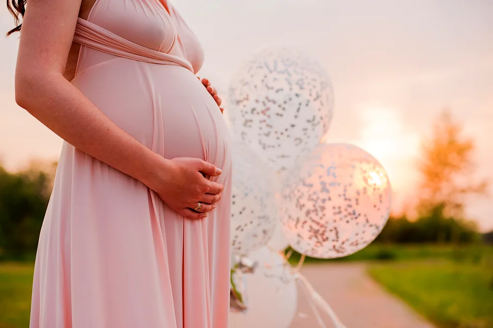 Pregnant woman painting