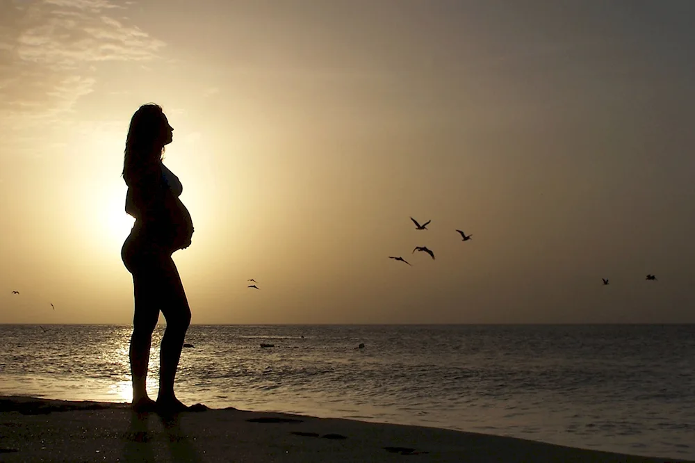 Pregnant girl at sea