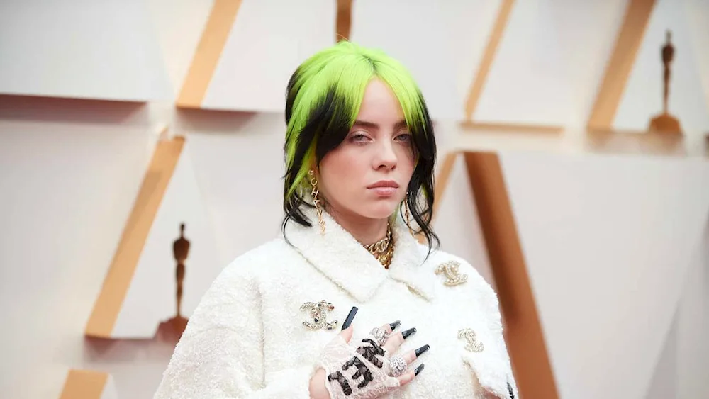 Billy Ilish with green hair