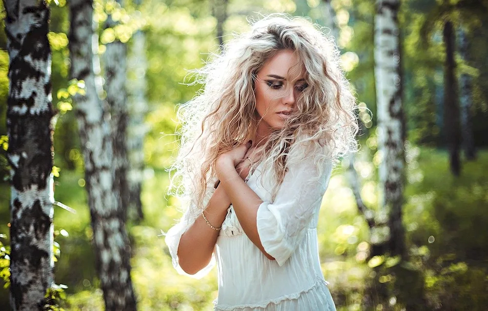 Blonde with curly hair