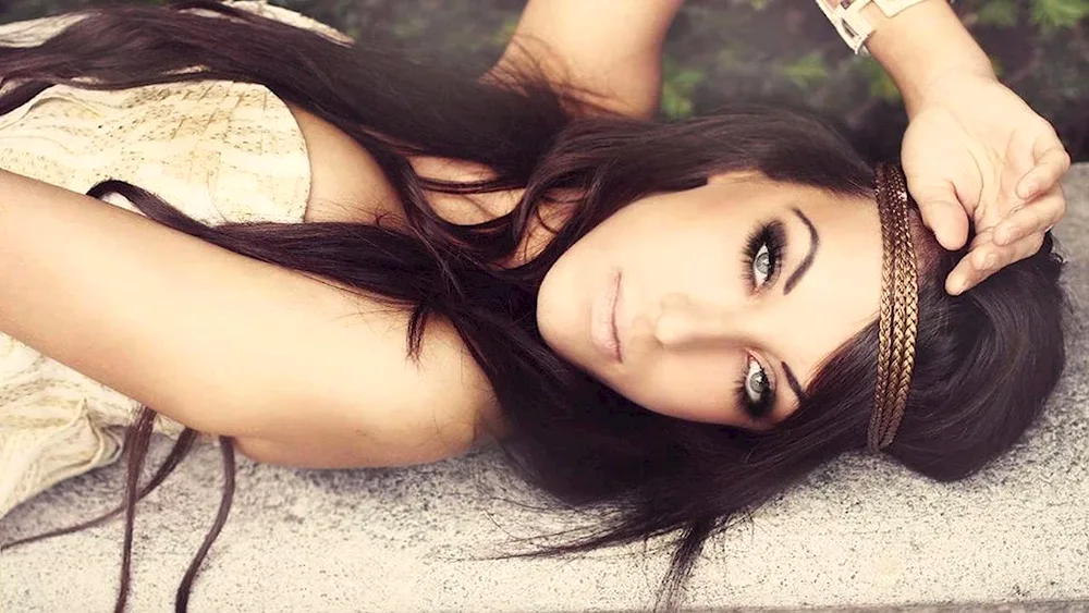 Brunette with long hair with glasses