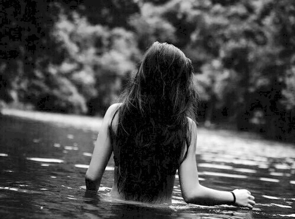 Brunette from the back in nature