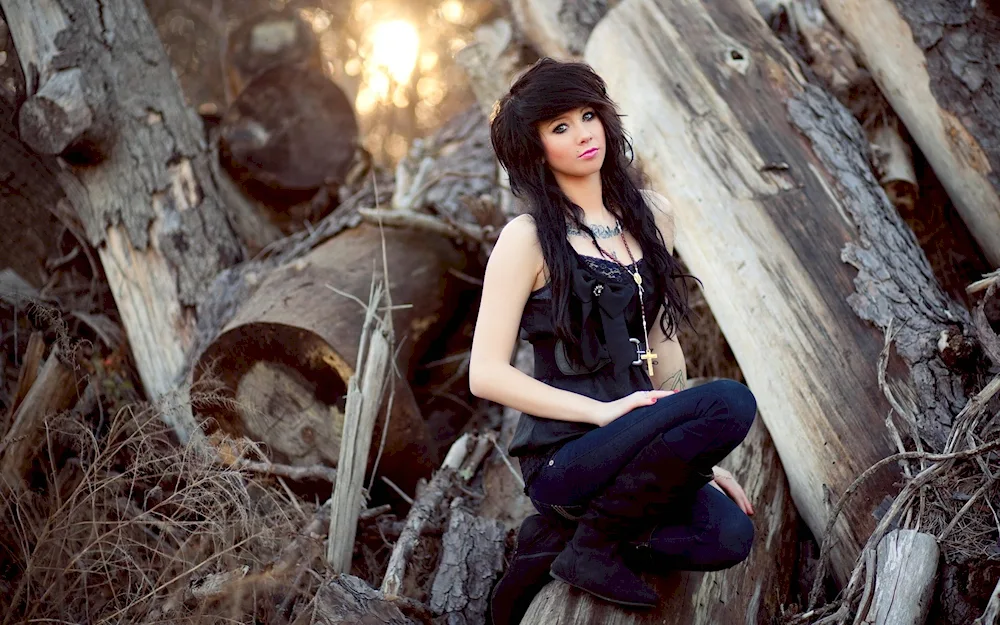 Brunette by a tree