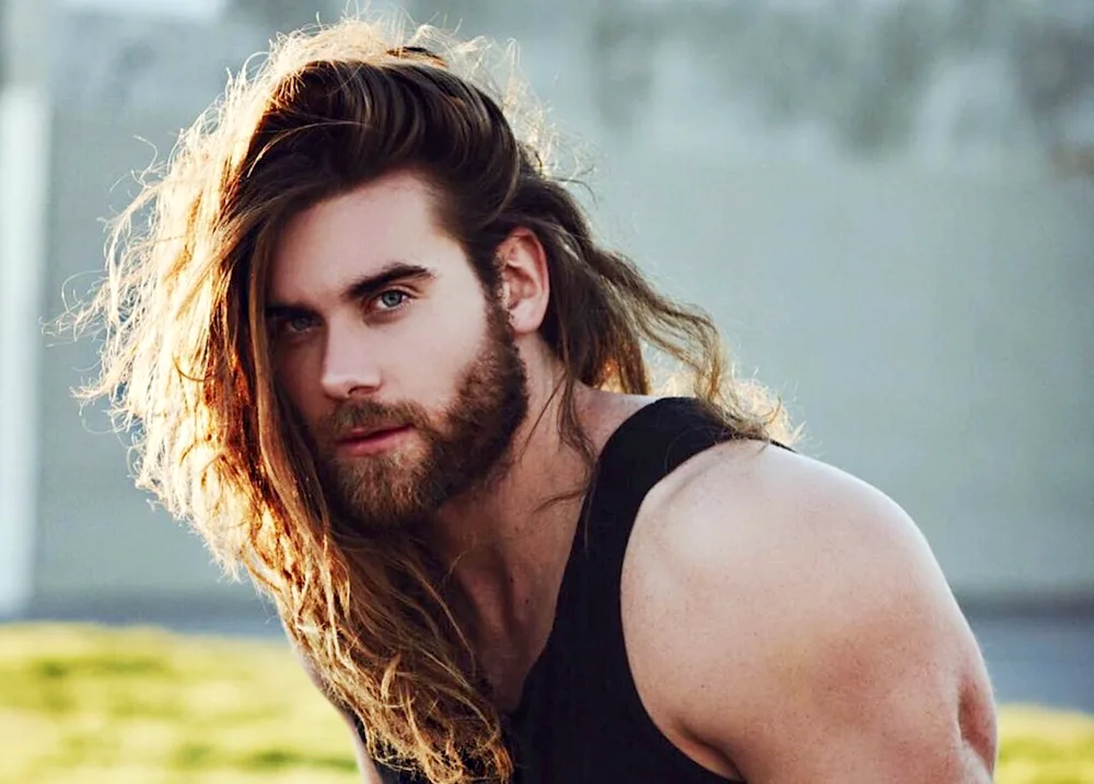 Man bun with long curly hair