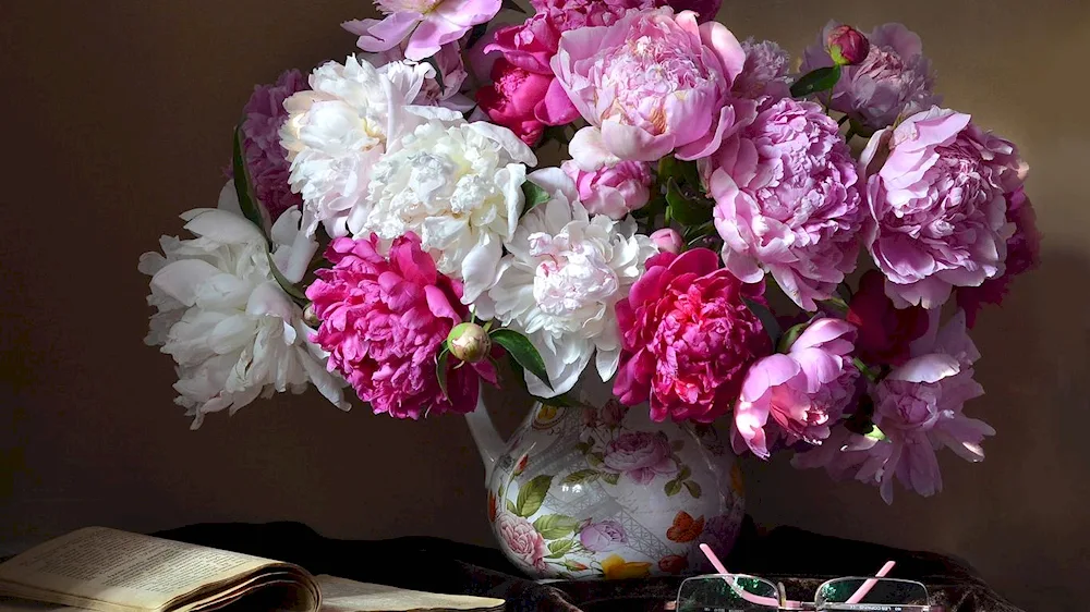 Bouquet of peonies and lilacs