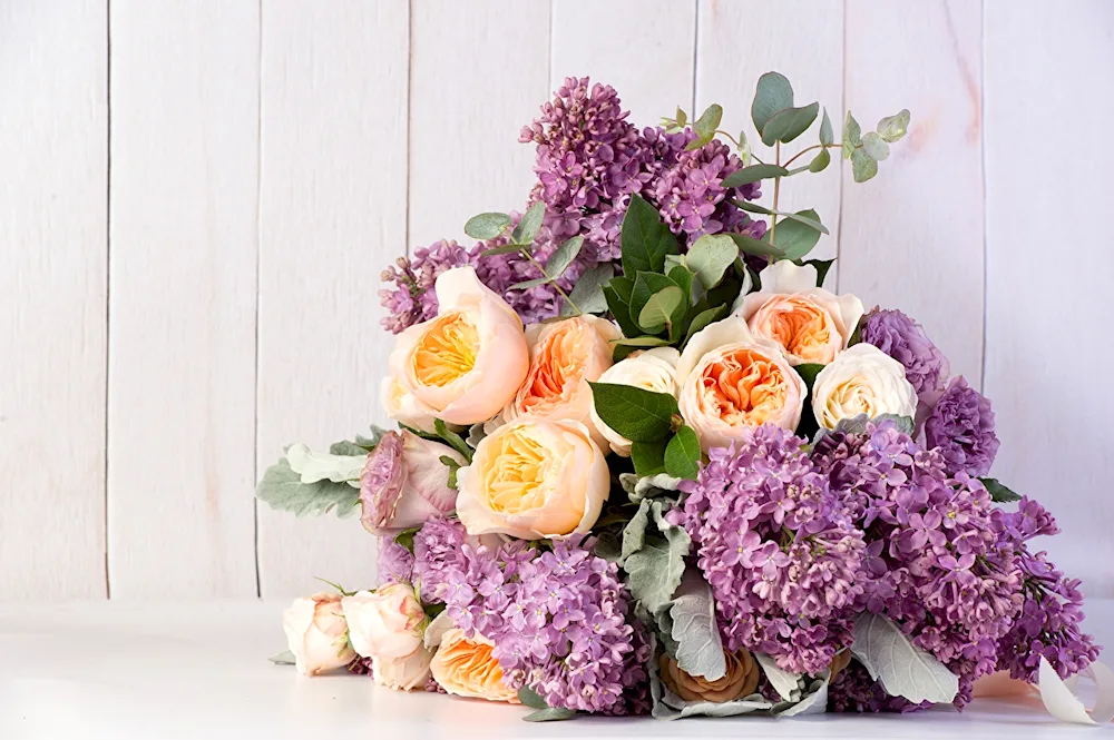 Bouquet of peonies and lilacs