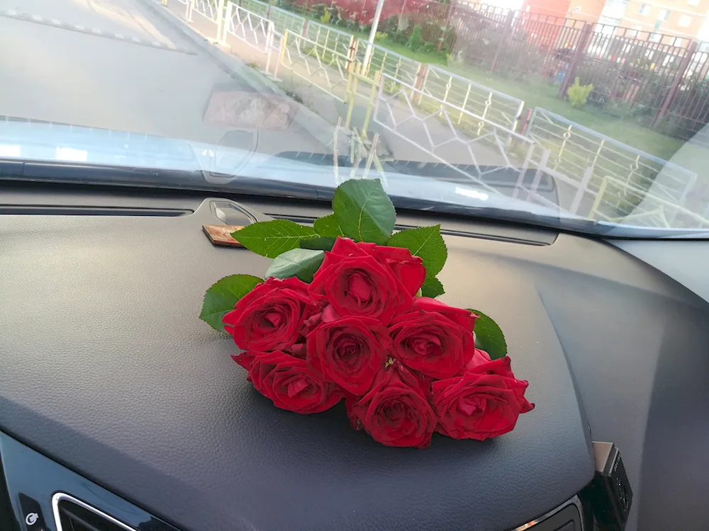 A bunch of flowers in the car