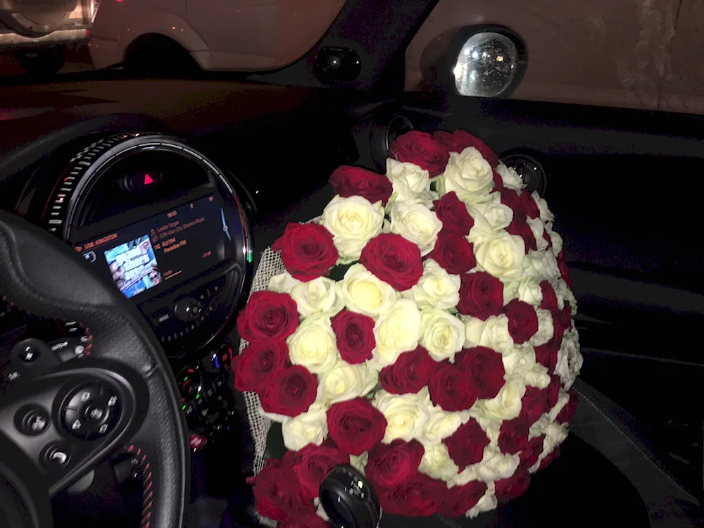 A bouquet of flowers in the car