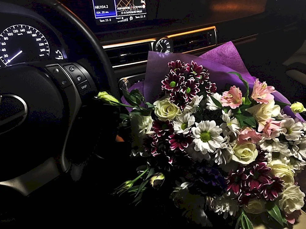 A bunch of flowers in the car