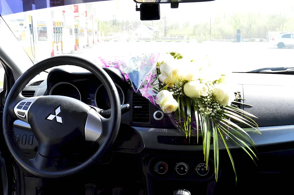 Bouquet of flowers in the car