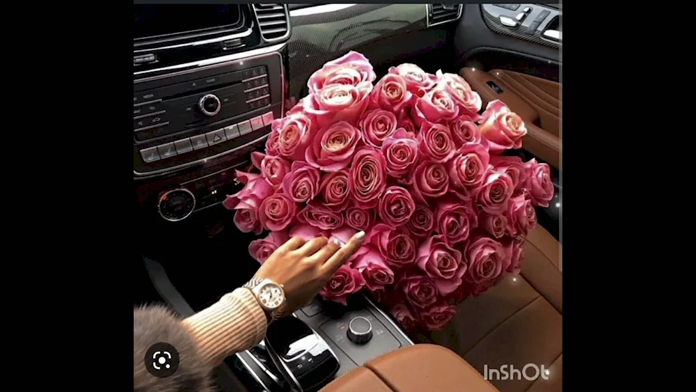 A bouquet of flowers in the car