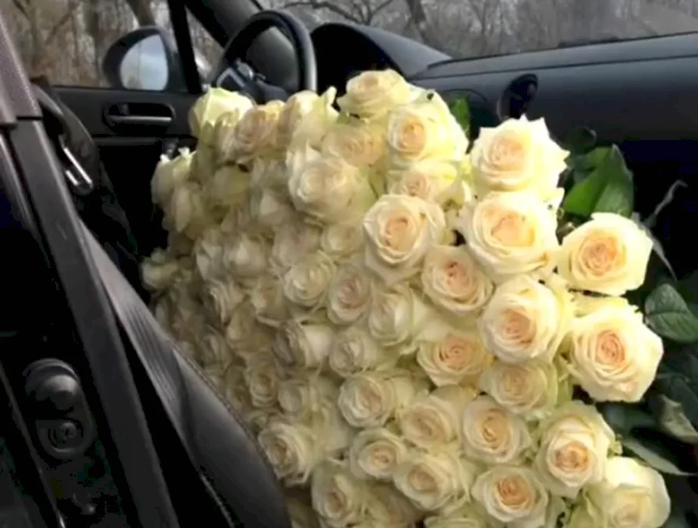 Bouquet of roses in the car