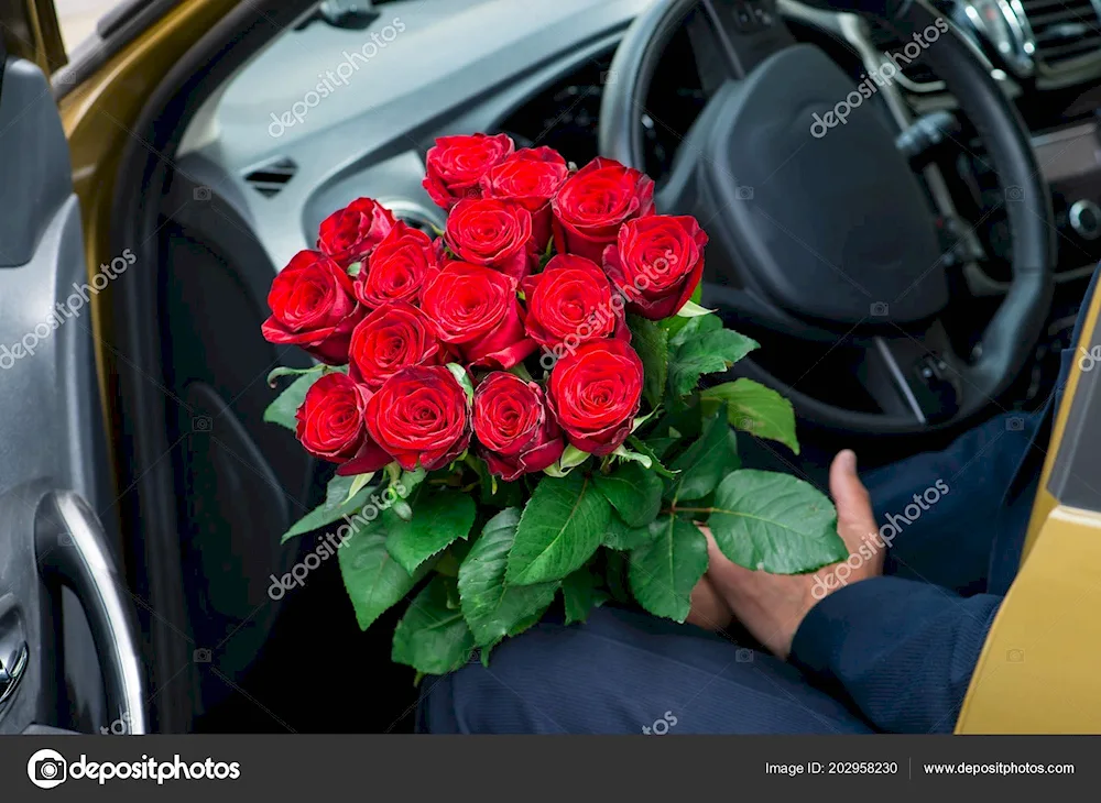 A bouquet of flowers in the car