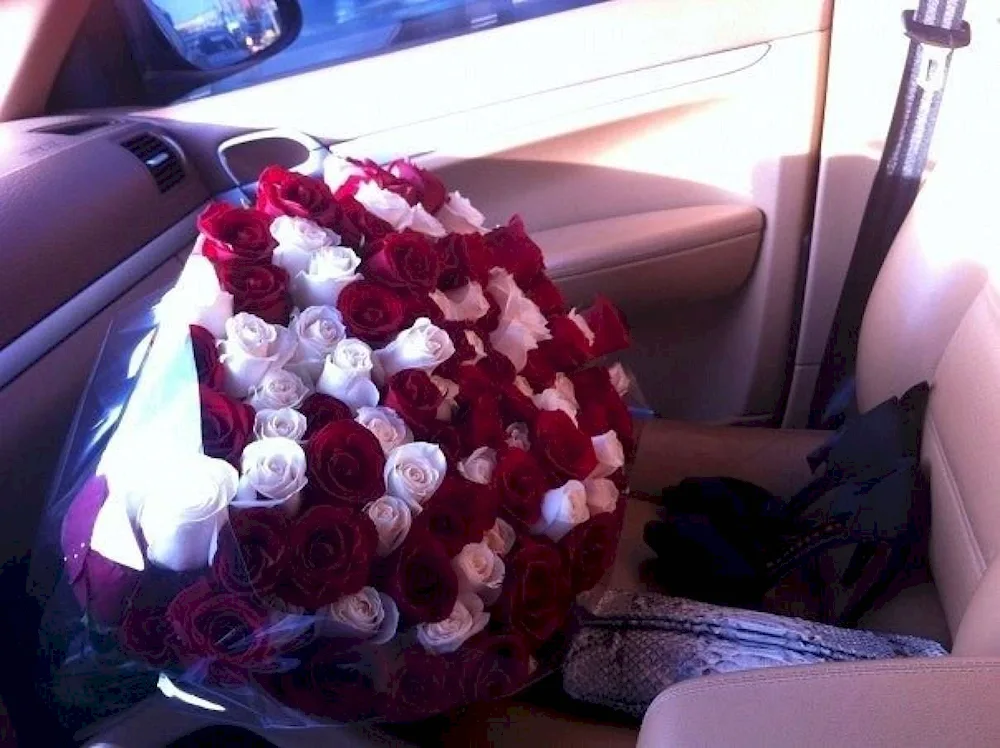 A bouquet of flowers in the car