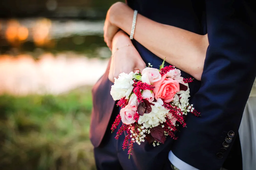 Flowers in hand.