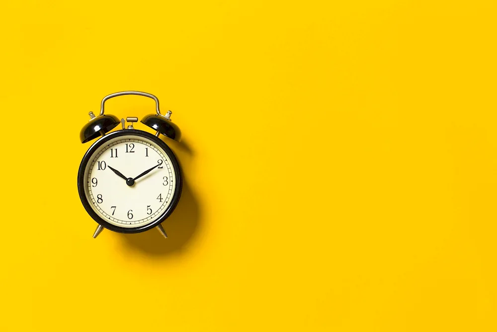 Clock on yellow background