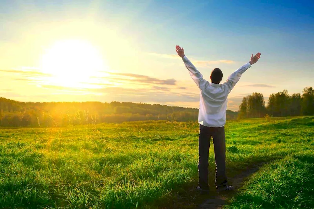 Man rejoicing in the sunshine