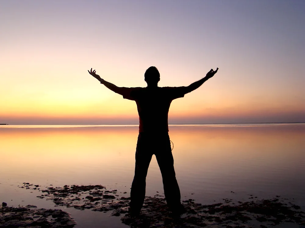 Man with arms outstretched. hands