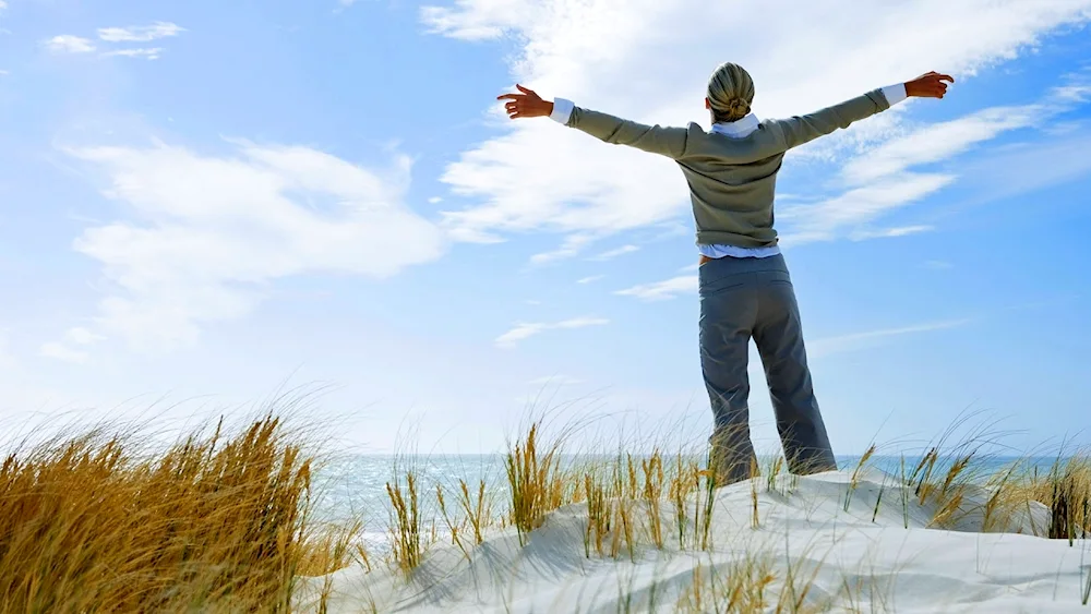 Man with arms outstretched