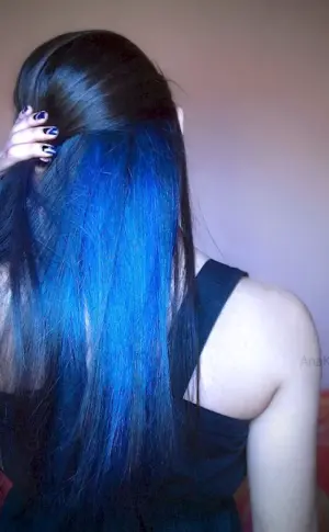 Black hair with blue strands