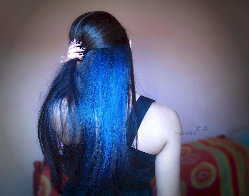 Black hair with blue strands