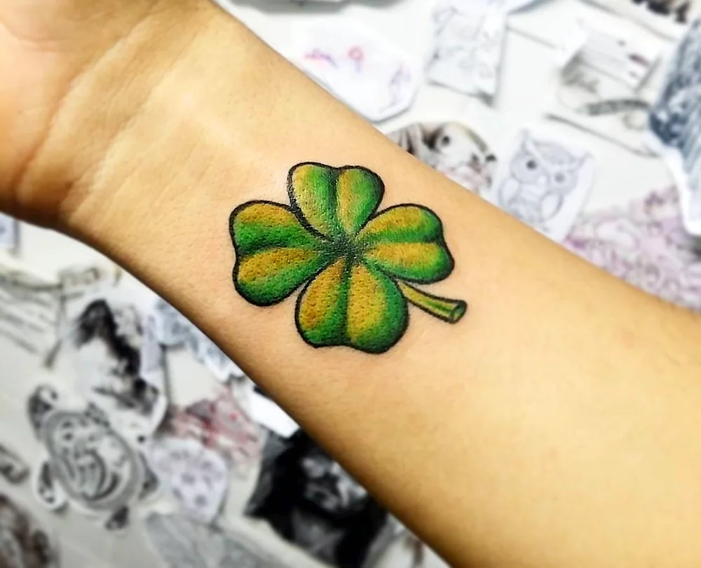 Four-leaf clover tattoo symbol