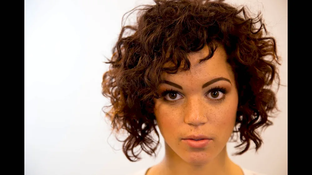 Bob Garson haircut for medium curly hair