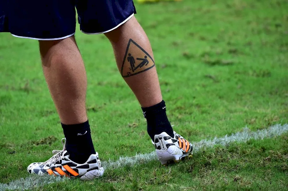 Tattoo on the shin.