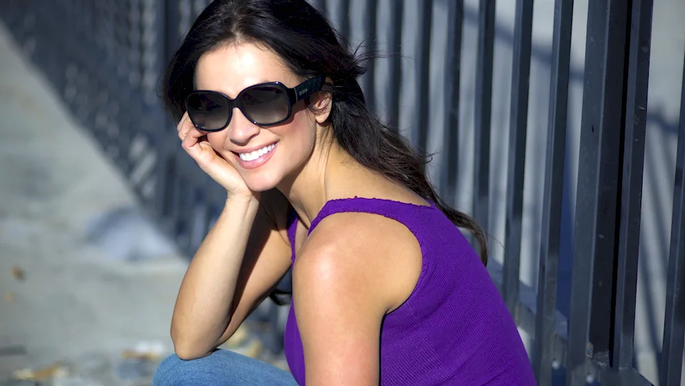 Denise Milani with glasses