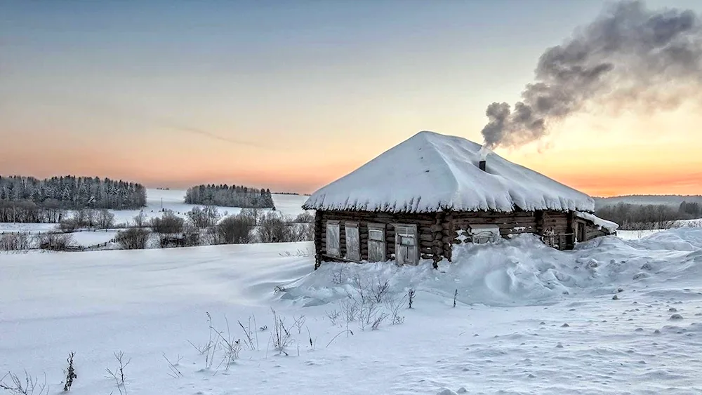 Winter cottage in the village