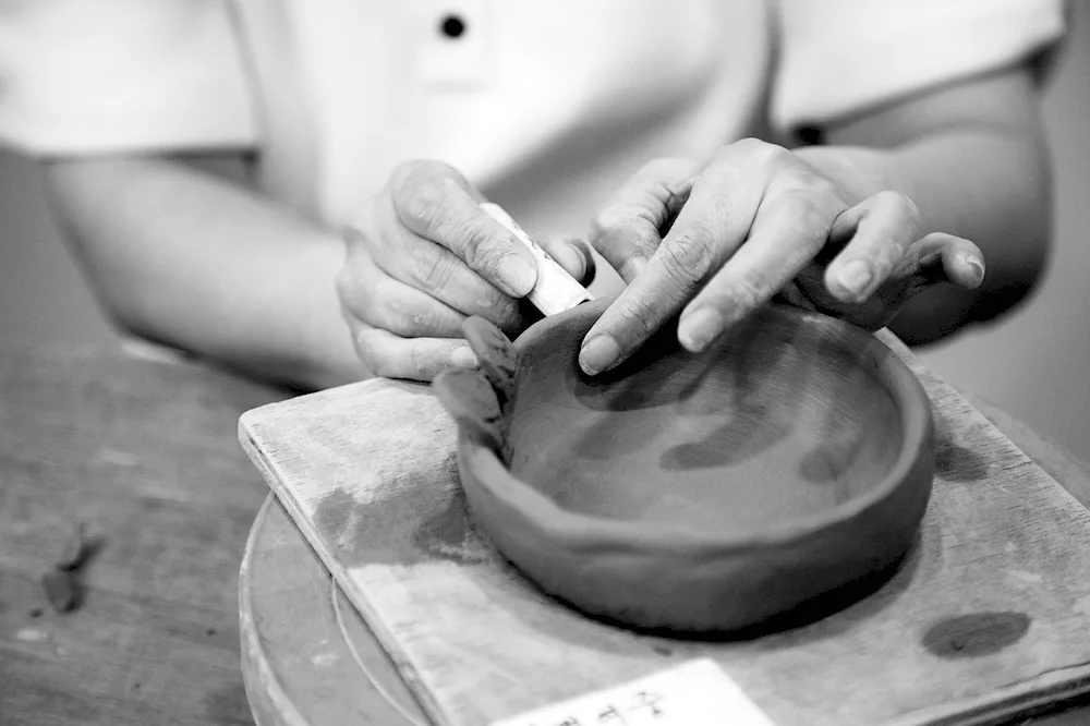 Children sculpting from clay