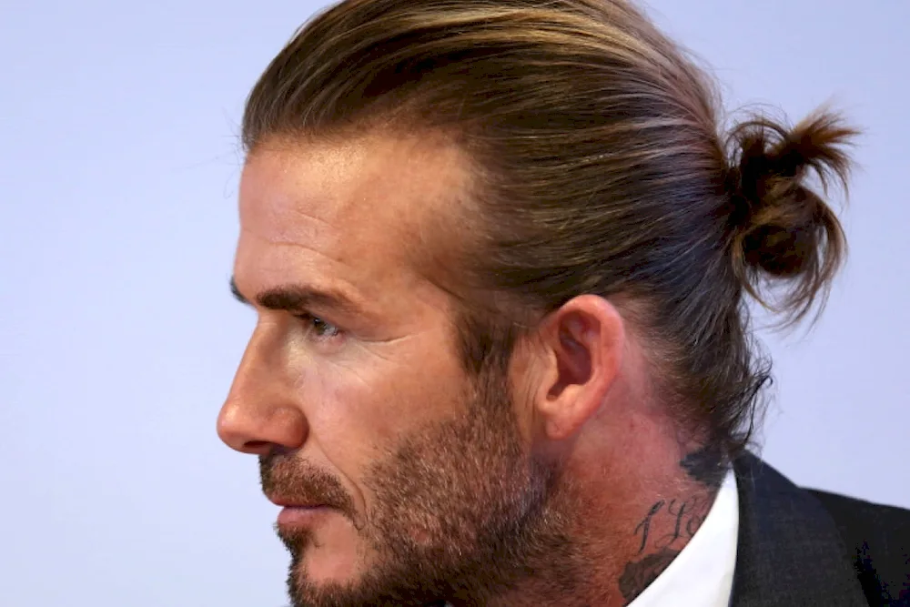 Top knot haircut for men