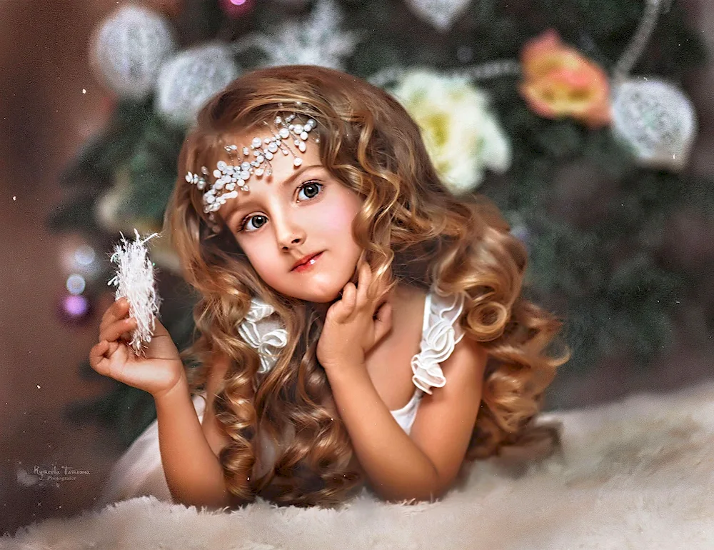 Girl with curls and Christmas tree toys picture