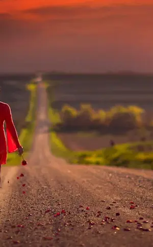 Girl walking on the road