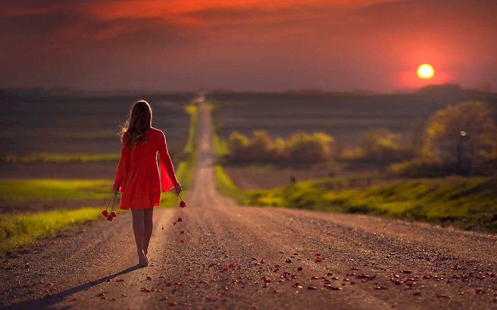 Girl walking on the road