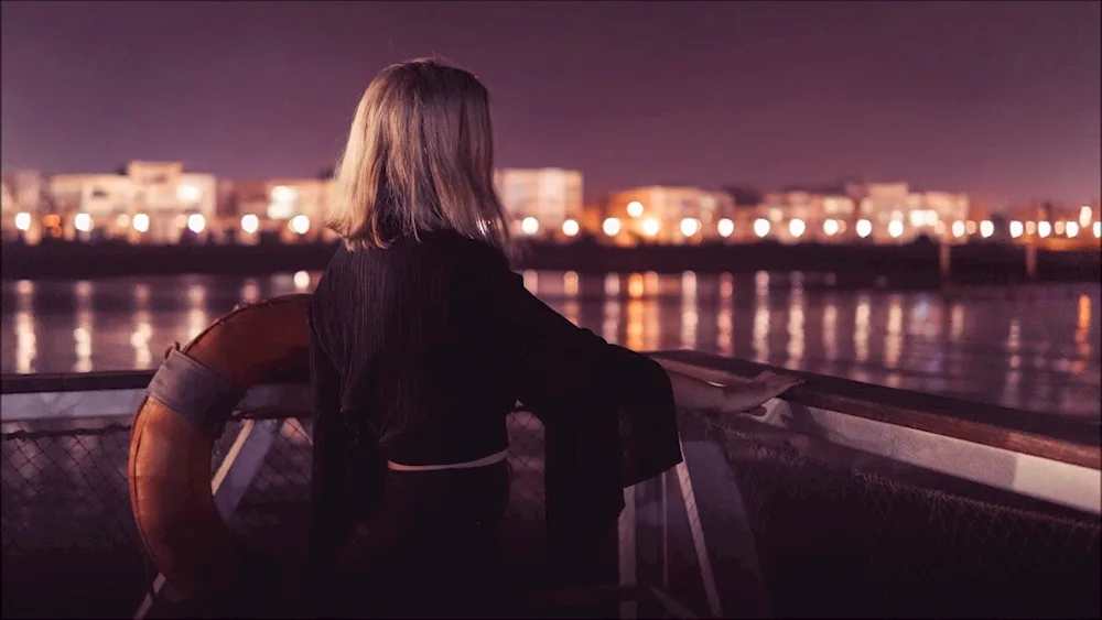 Girl in the background of the night city