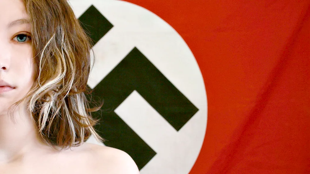 Girl in front of swastika