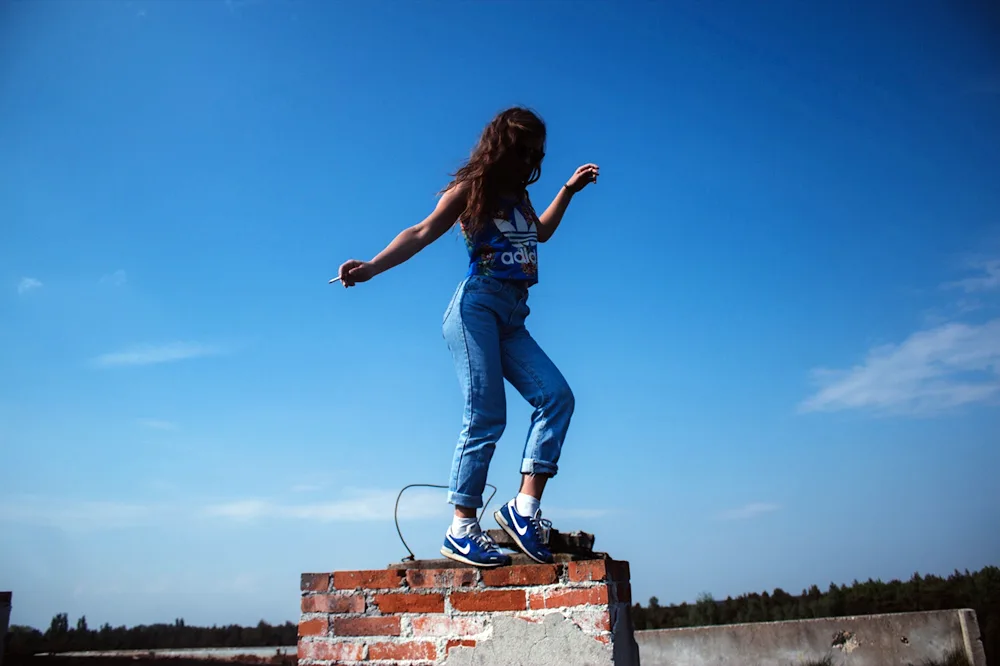 Boy and girl on the roof