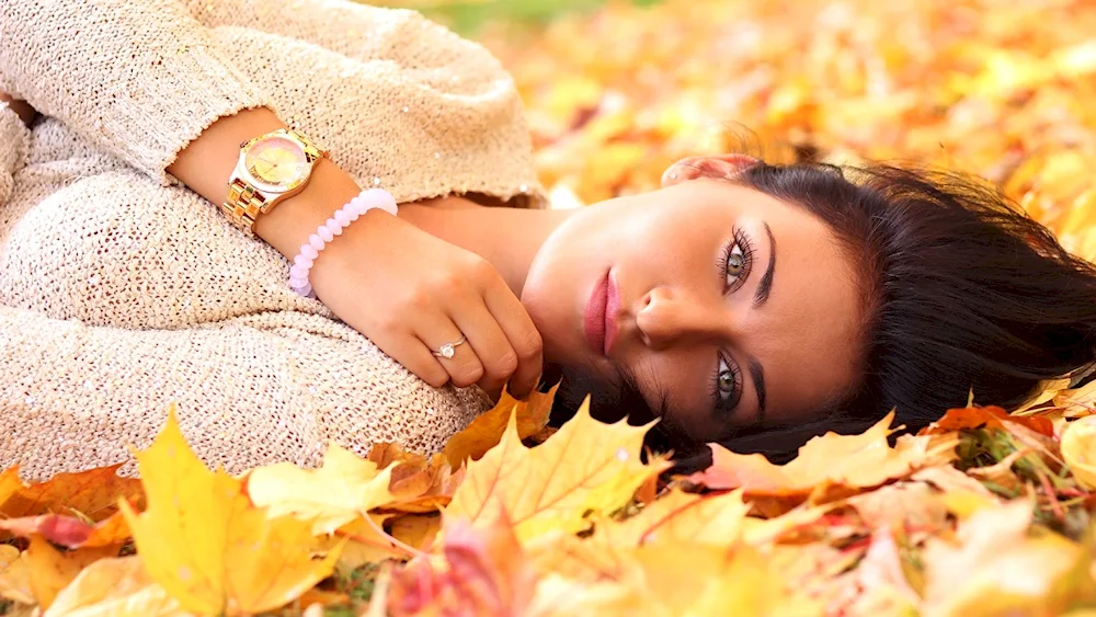 Autumn girl with autumn leaves