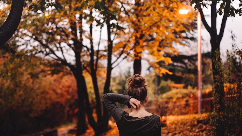 Autumn girl from back