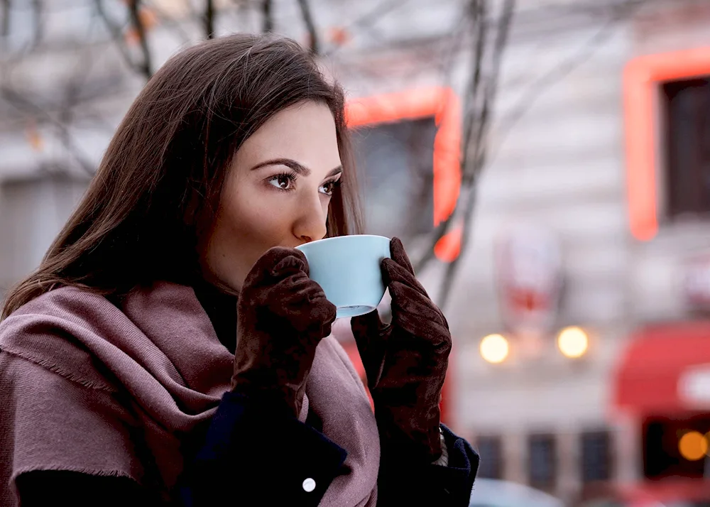 Girl in a coffee shop by the window